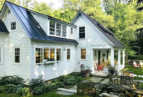 white painted brick house with metal roof|brick house metal roof colors.